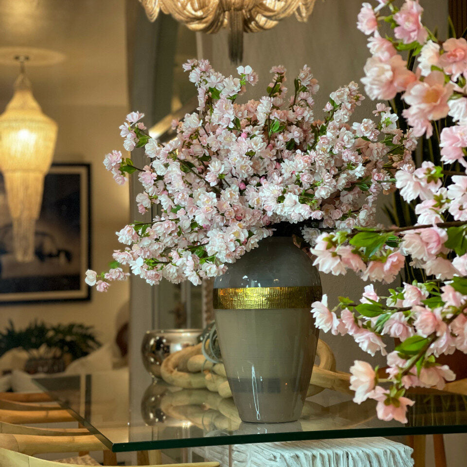 "Goddess" vase with pink cherry blossoms